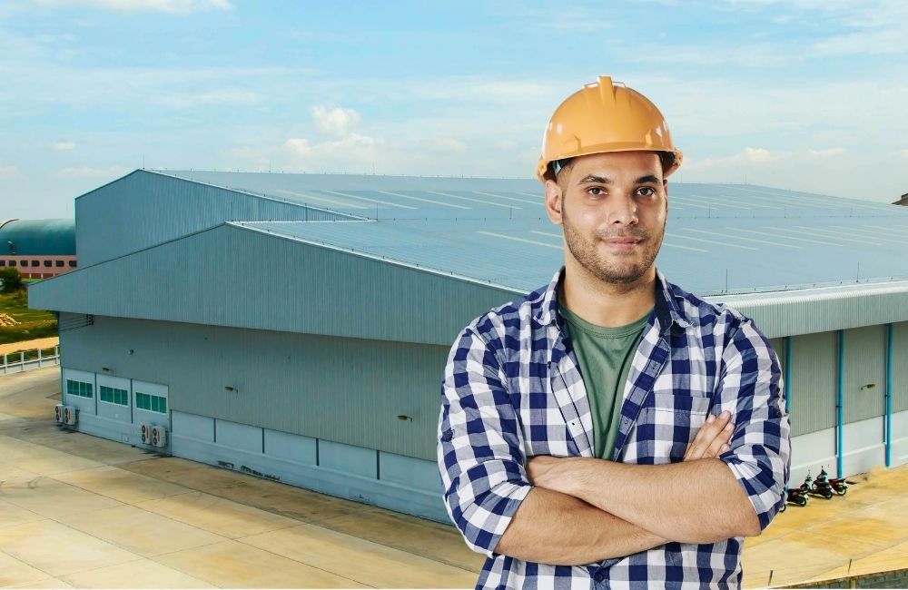Person with yellow construction headgear