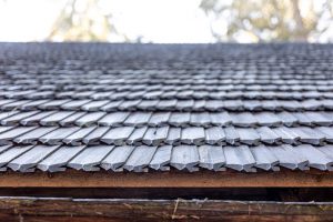 Closeup for roof house made of wooden tiles