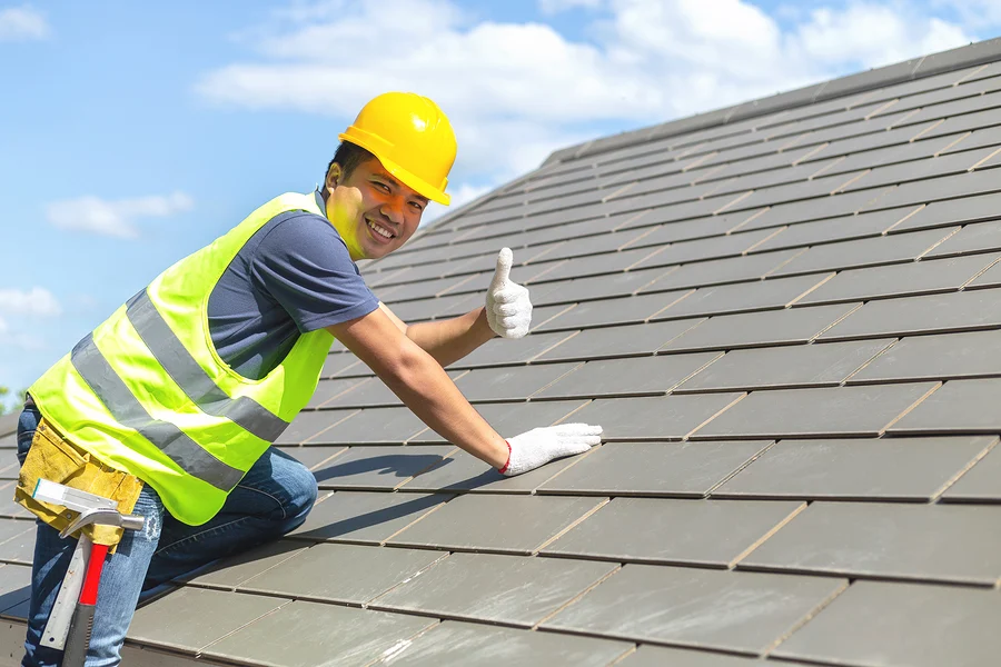 Roof contractor doing roof inspection